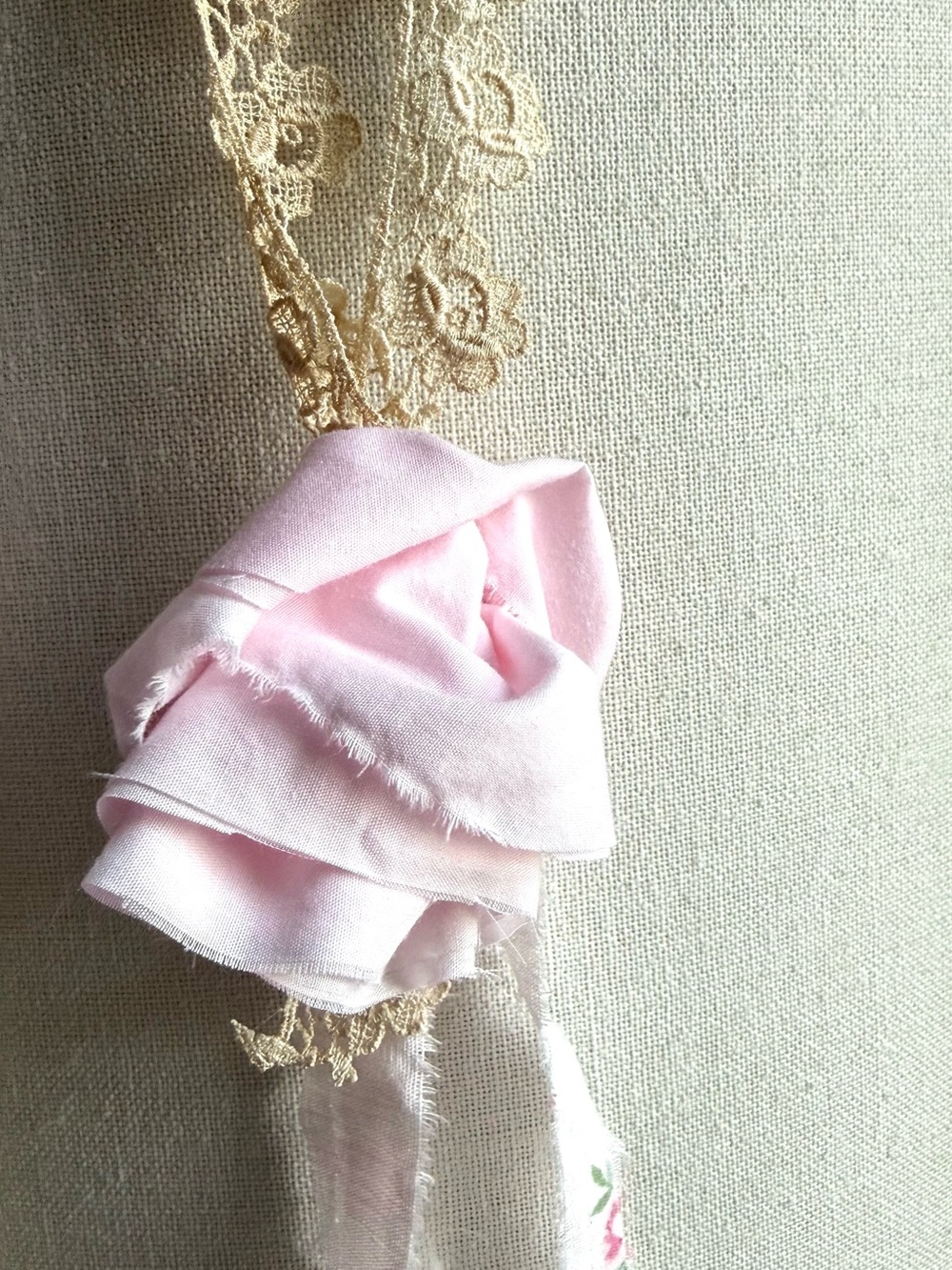 pink fabric with vintage lace upper and rose flowered bottom